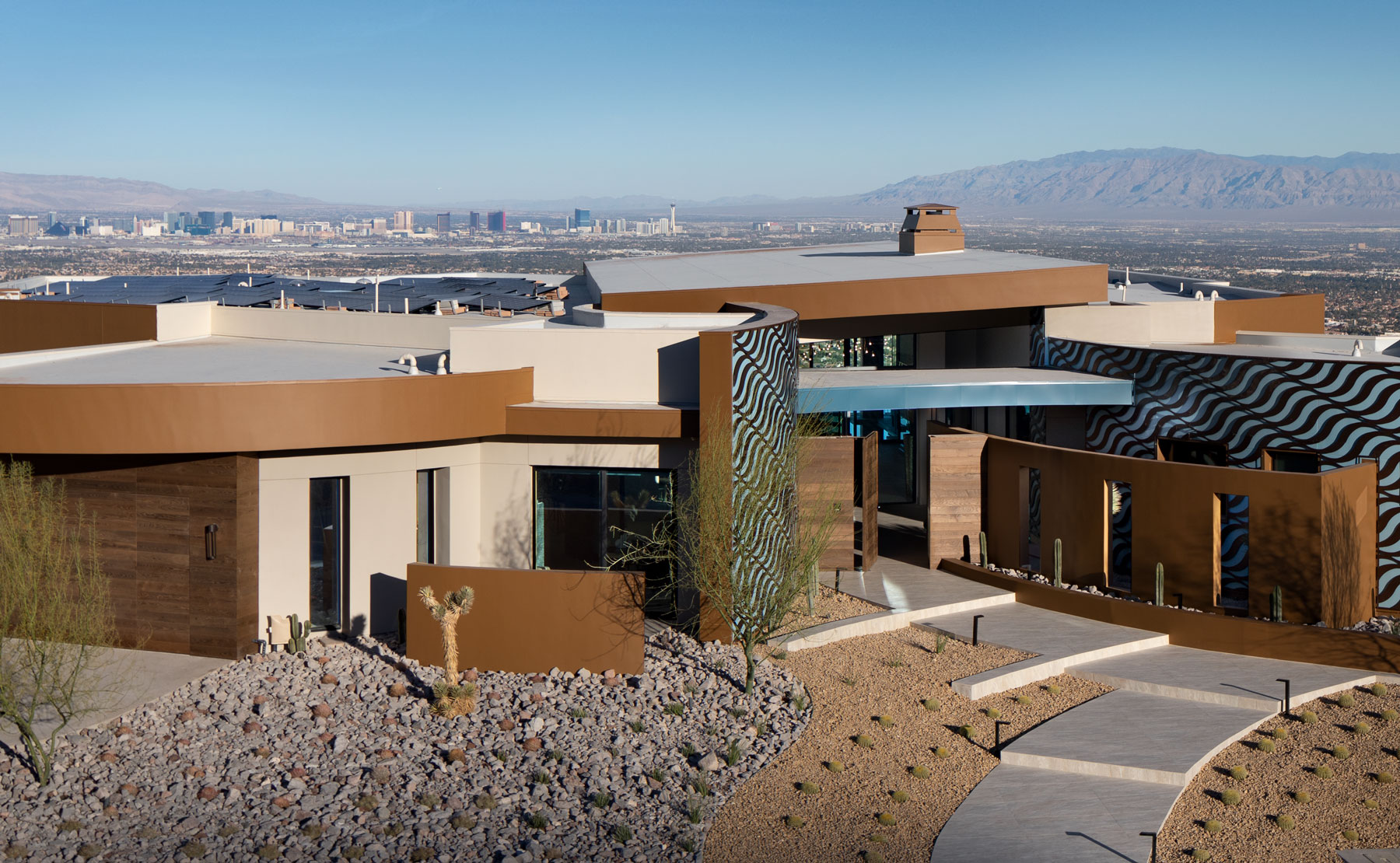 Exterior shot of the 2020 NAHB New American Home by Sunwest set in the mountains outside of Las Vegas, overlooking the strip.