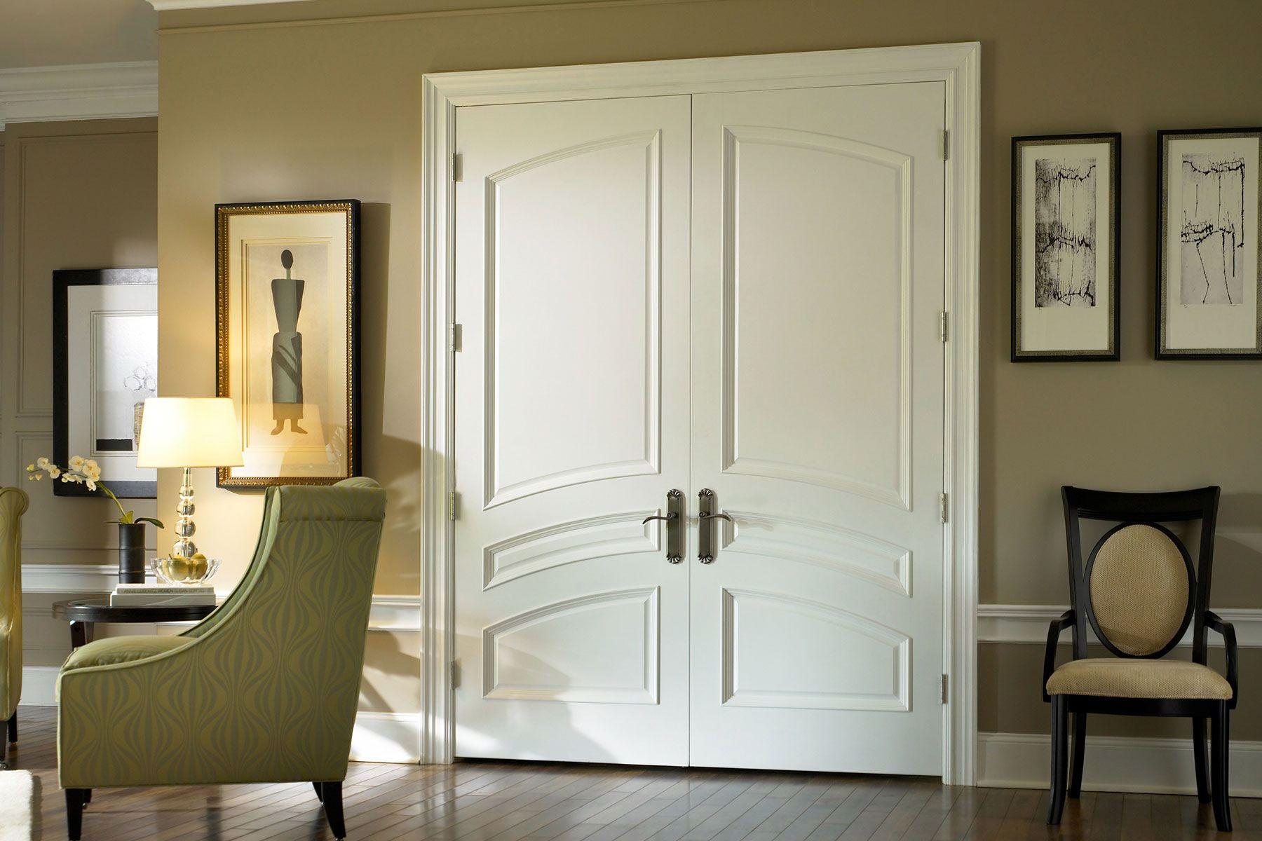 white common arch pair contemporary doors with bolection moulding and scoop panels
