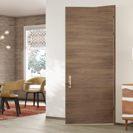 TMF1000 modern flush wood door in walnut with White Haze stain.