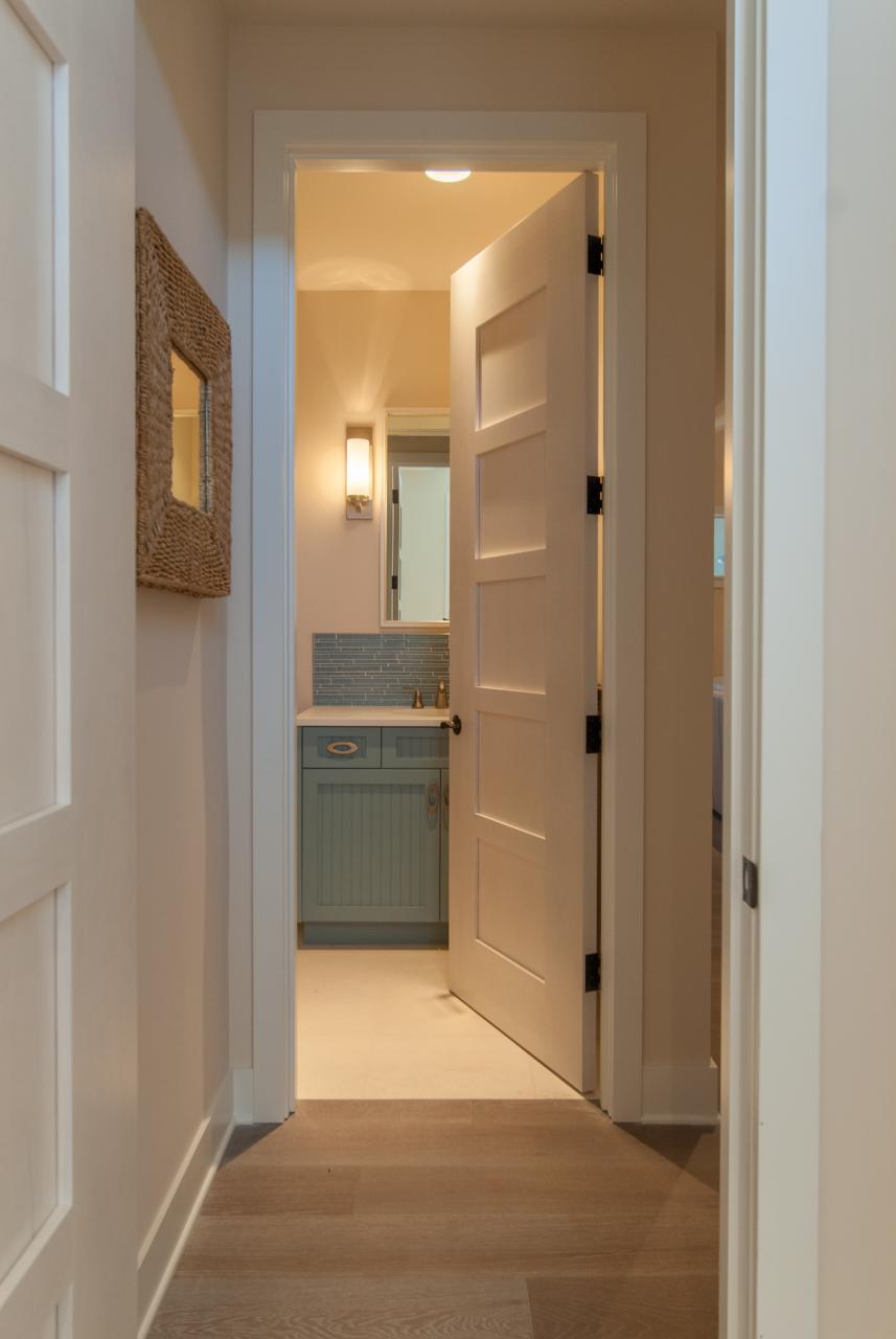 TM5000 birch door features custom whitewash finish to match the pastel color scheme of the home.