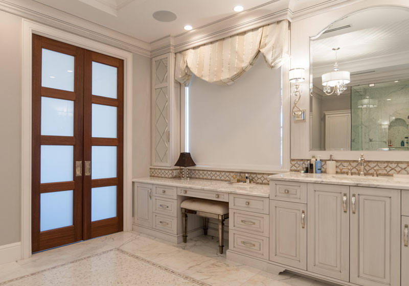 TS4100 pocket doors in mahogany with White Lami glass