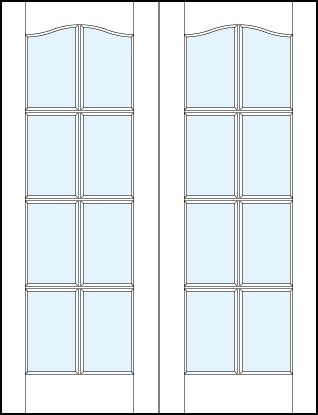 pair of custom interior glass french doors with eight true divided lites and cathedral top