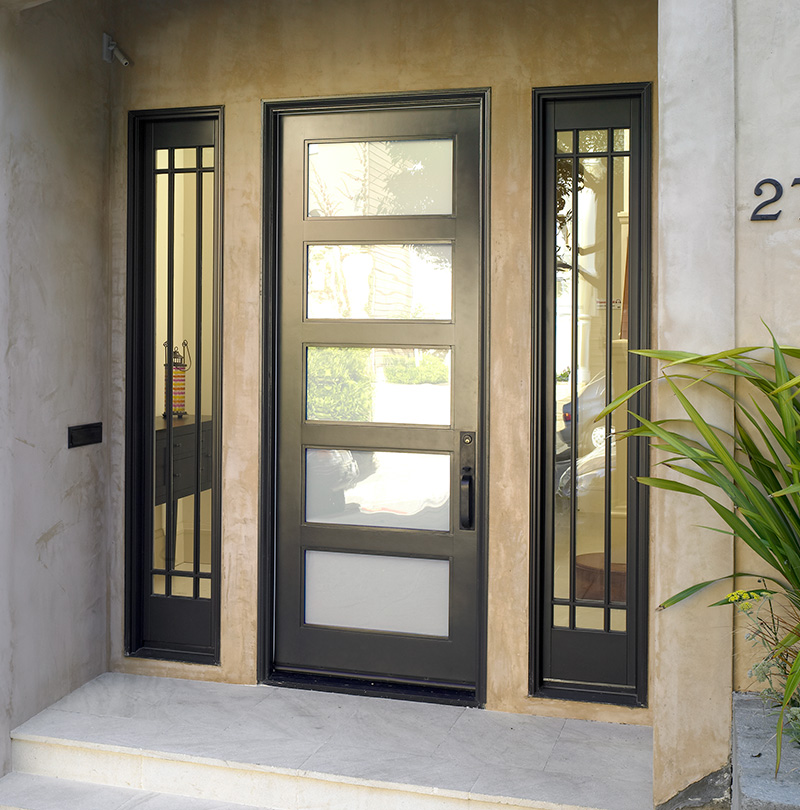 A TruStile TS5000 residential exterior door made from MDF with white lami glass
