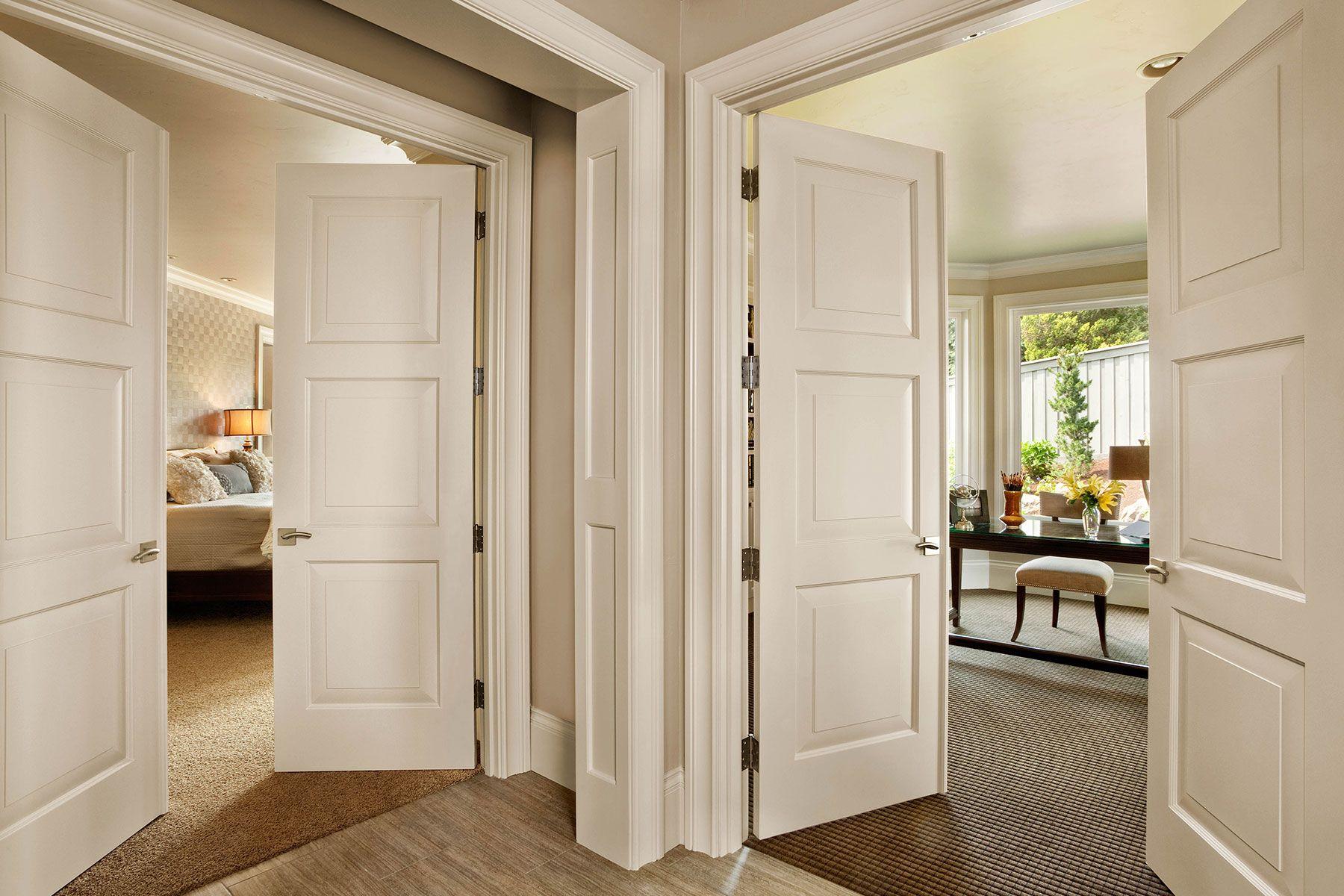 pair of white three panel traditional door entry systems