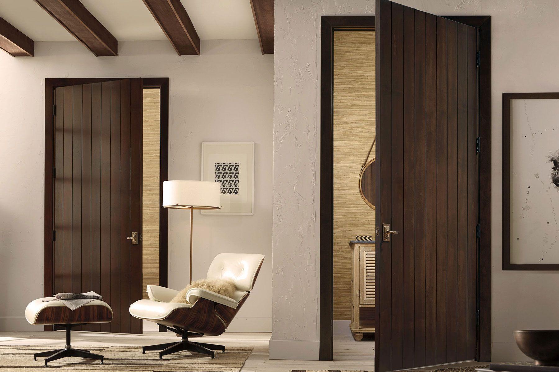 two modern dark oak plank style interior doors