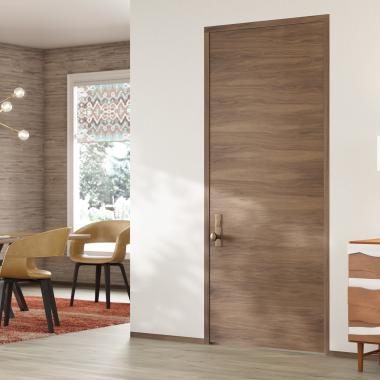 TMF1000 modern flush wood door in walnut with White Haze stain.