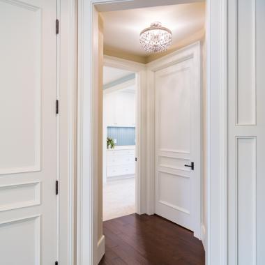 Hallway with TS3070 doors in MDF with Bolection moulding (BM) and Flat (C) panel.