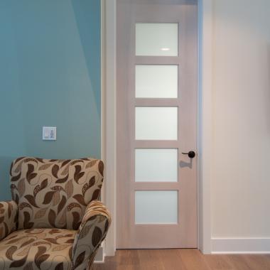 TM5000 in birch with frosted glass. The custom whitewash finish ties in with the pastel color scheme of the home.