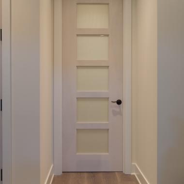 TM5000 in birch with frosted glass. The custom whitewash finish ties in with the pastel color scheme of the home.