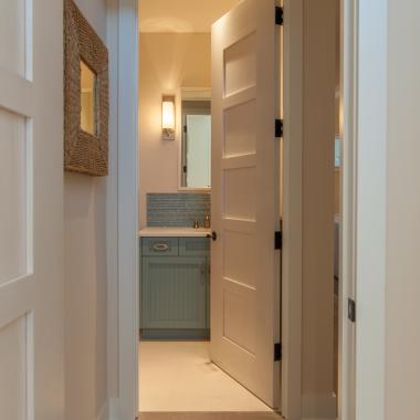 TM5000 birch door features custom whitewash finish to match the pastel color scheme of the home.
