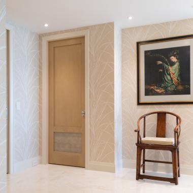 This master bedroom suite features modified TS2210 doors in wire-brushed plain sawn white oak with customer-applied ceruse finish and Shagree Grey Oyster leather.