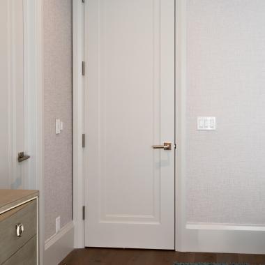 A guest room features TS1000 doors in MDF with Miracle (MR) moulding and Flat (C) panel.