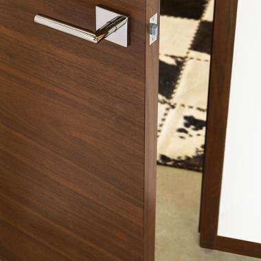 TMF1000 flush door in walnut with Nutmeg stain