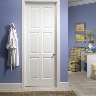 This bathroom features a TS6080 in MDF with custom sticking and raised (A) panel.