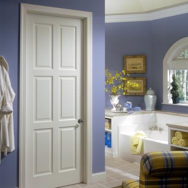 This bathroom features a TS6080 in MDF with custom sticking and raised (A) panel.