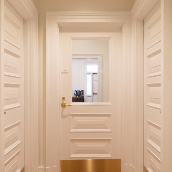 Custom MDF doors with clear glass, Bolection (BM) moulding and Raised (E) panel.