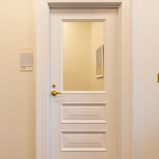 Custom MDF door with clear glass, Bolection (BM) moulding and Raised (E) panel.