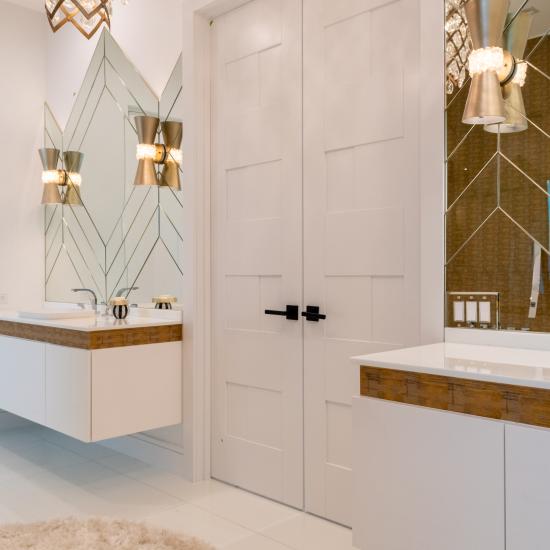 This modern master bath features TM9420 doors in MDF with flat panel inserts.