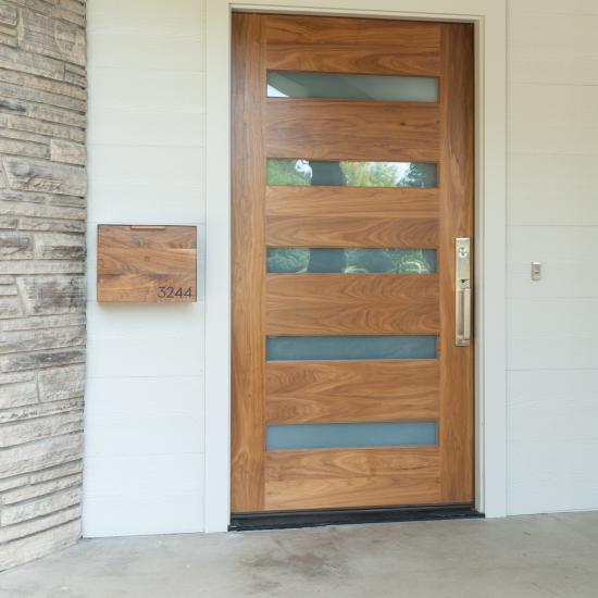 TM5100 exterior door in walnut with white lami glass and one step (OS) sticking