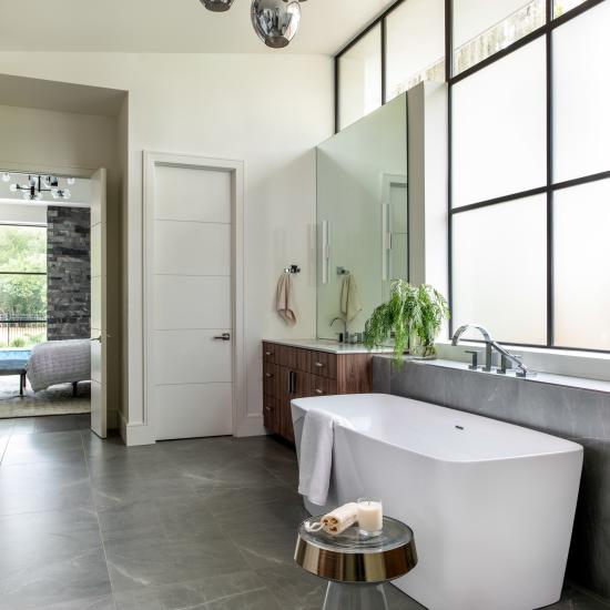 Master bath features TMIR5000 doors in MDF with 1/4" kerf cut reveal