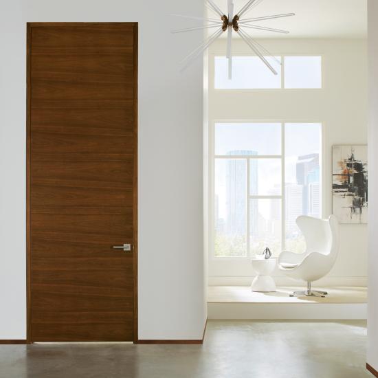 TMF1000 flush door in walnut with Nutmeg stain