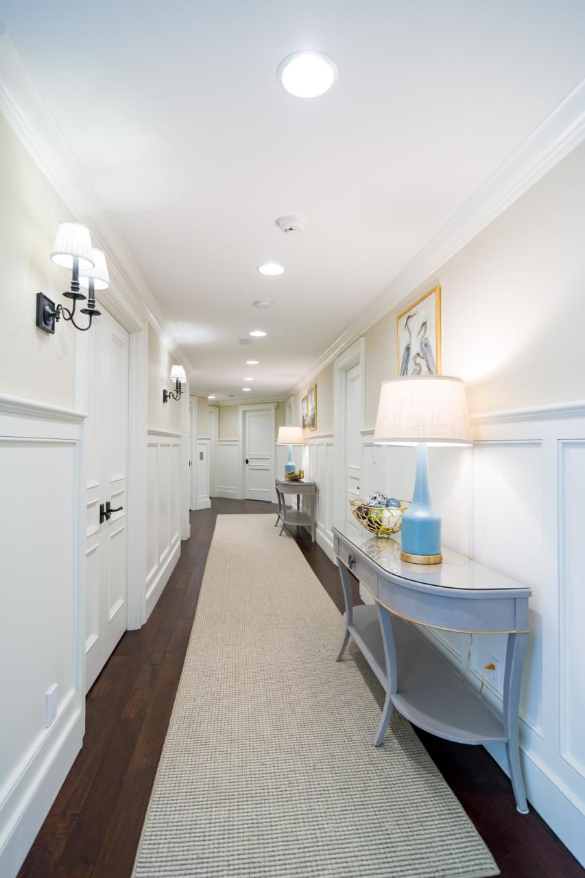 Hallway lined with TS3070 doors in MDF with Bolection moulding (BM) and Flat (C) panel.