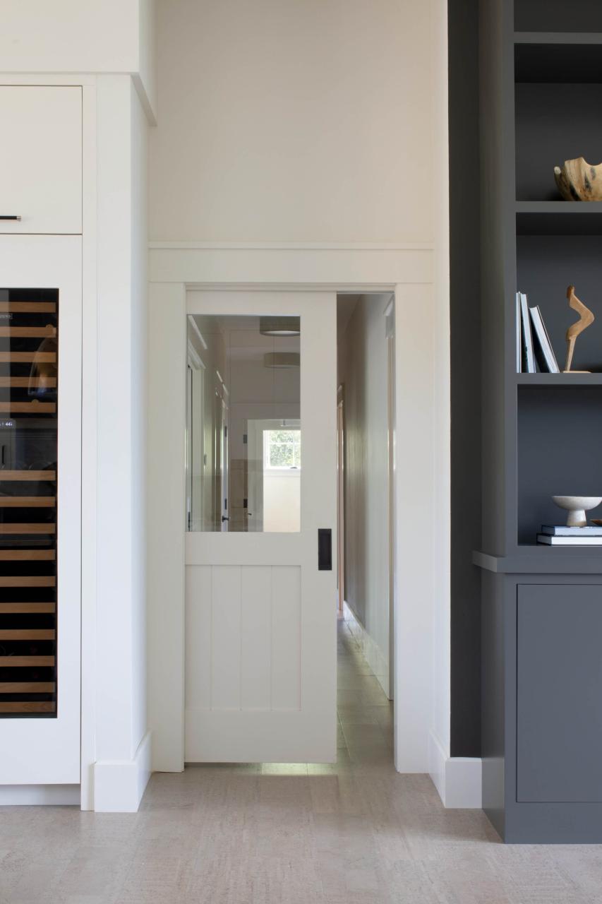 VG2100 pocket door in MDF with Square Stick (SS) sticking, V-groove panel and top panel replace with clear glass.