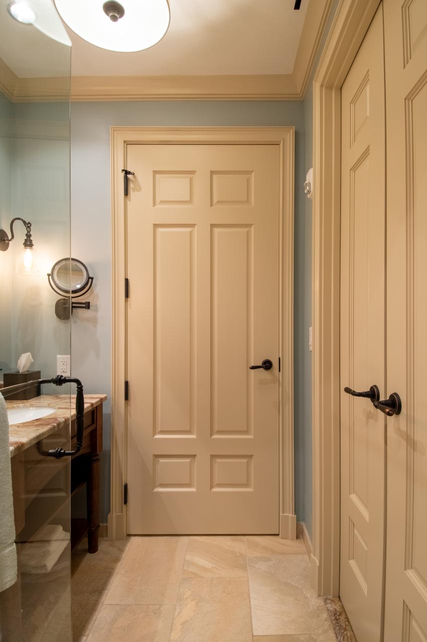 Bathroom with TS650 in MDF with Roman Ogee (OG) sticking and Scoop (B) panel. Pair of TS3100 doors to right.