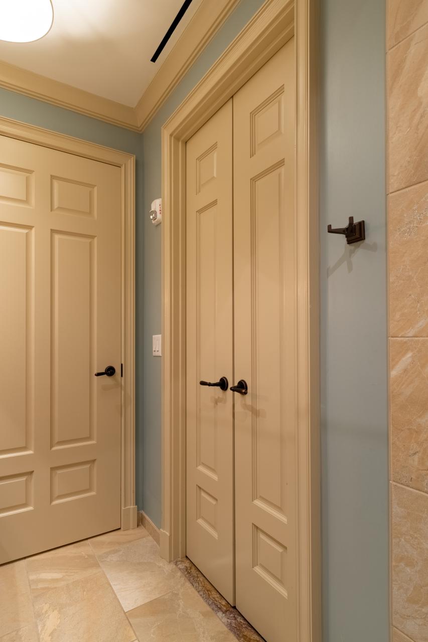 Pair of TS3070 doors in MDF with Roman Ogee (OG) sticking and Scoop (B) panel. Coordinating TS6050 to left.