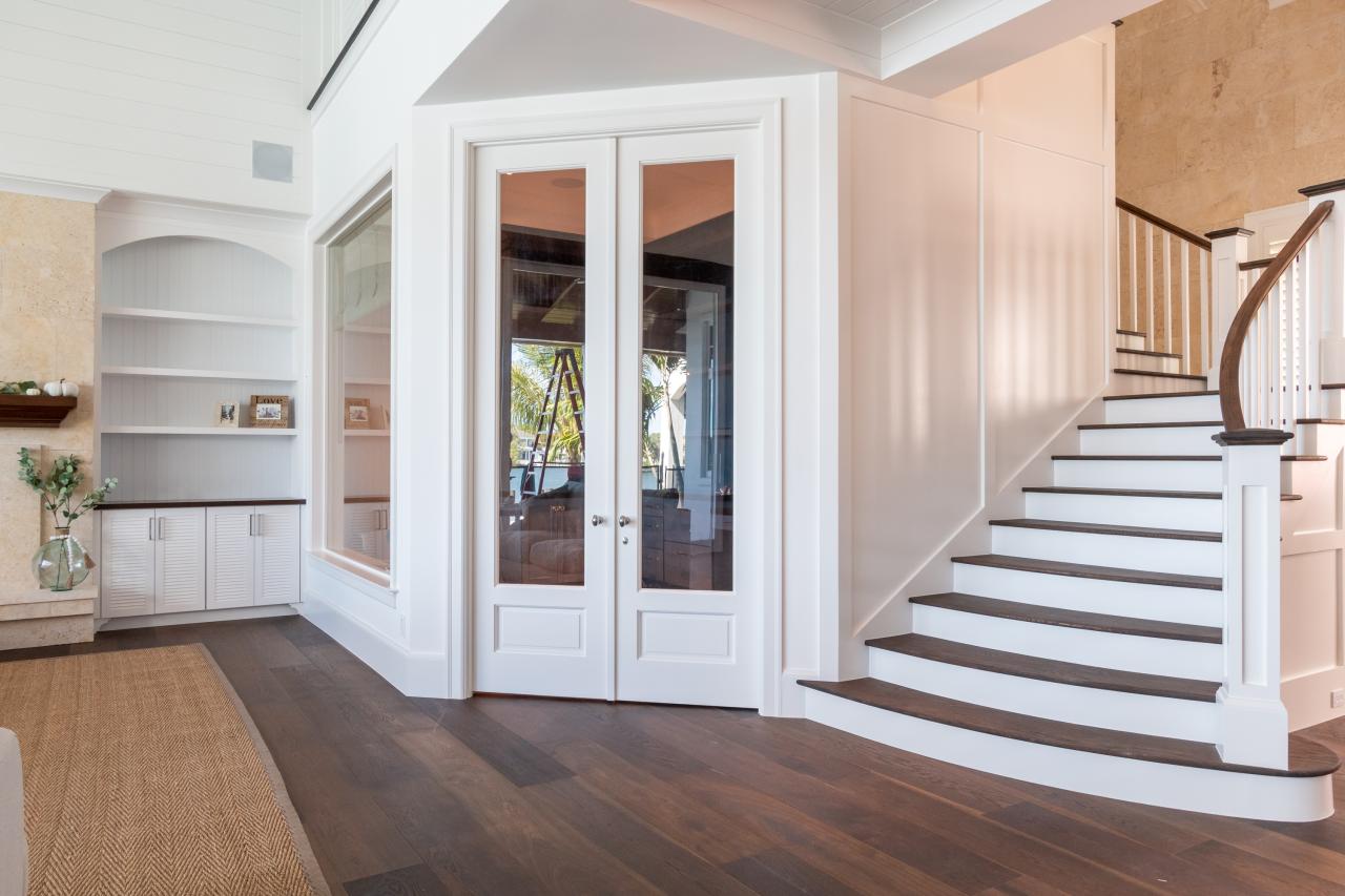 A study next to the living room features a pair of FL110 doors in MDF with Roman Ogee (OG) sticking, Raised (A) panel and clear glass.