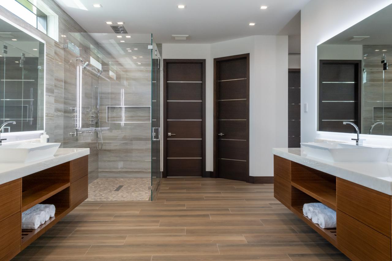 This master bath features TMIR6000 doors in mahogany with ½" bright stainless steel inlay. Builder provided stain finish.