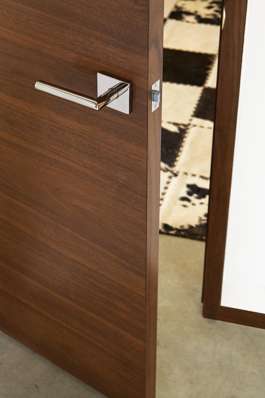TMF1000 flush door in walnut with Nutmeg stain