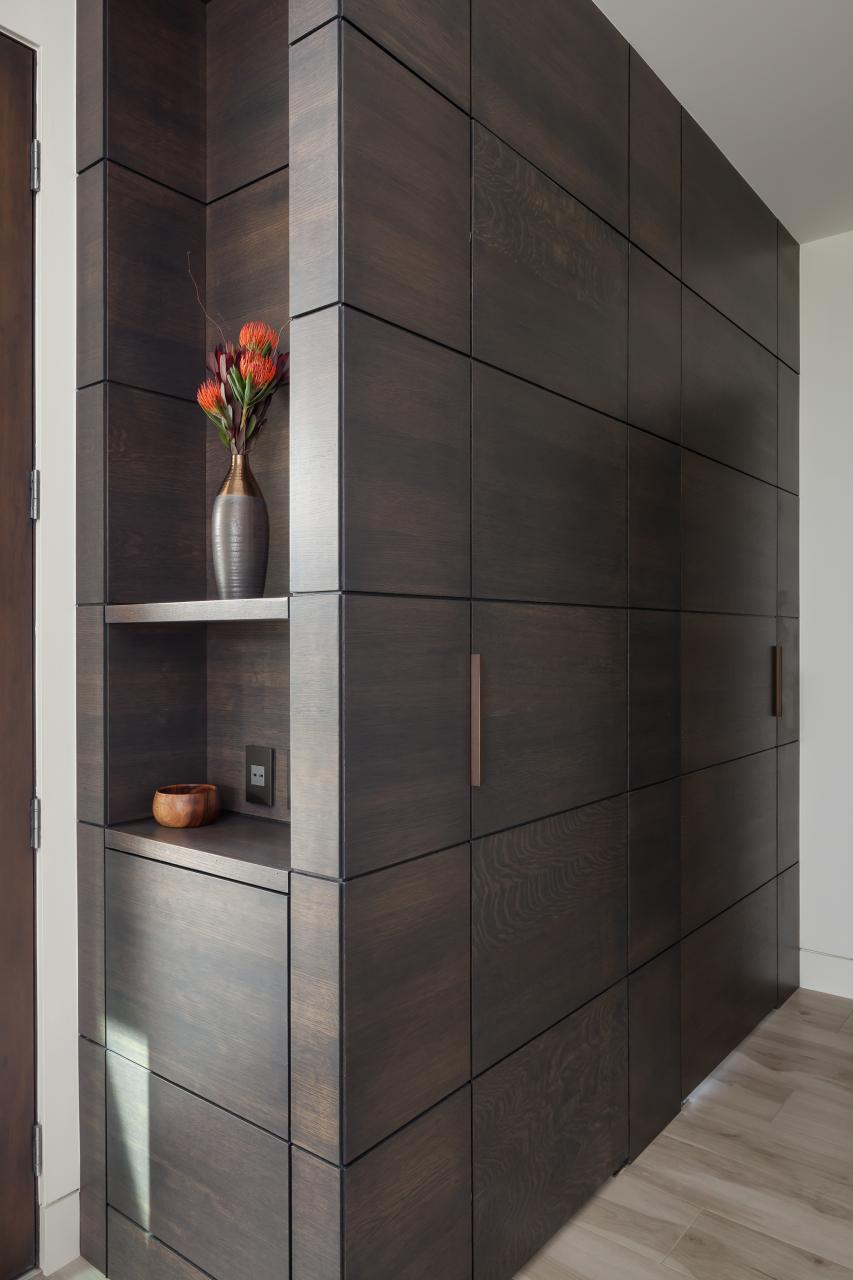 This cabinet features carefully concealed TMIR5000 doors in rift sawn white oak with Espresso stain and ¼" kerf cut reveal