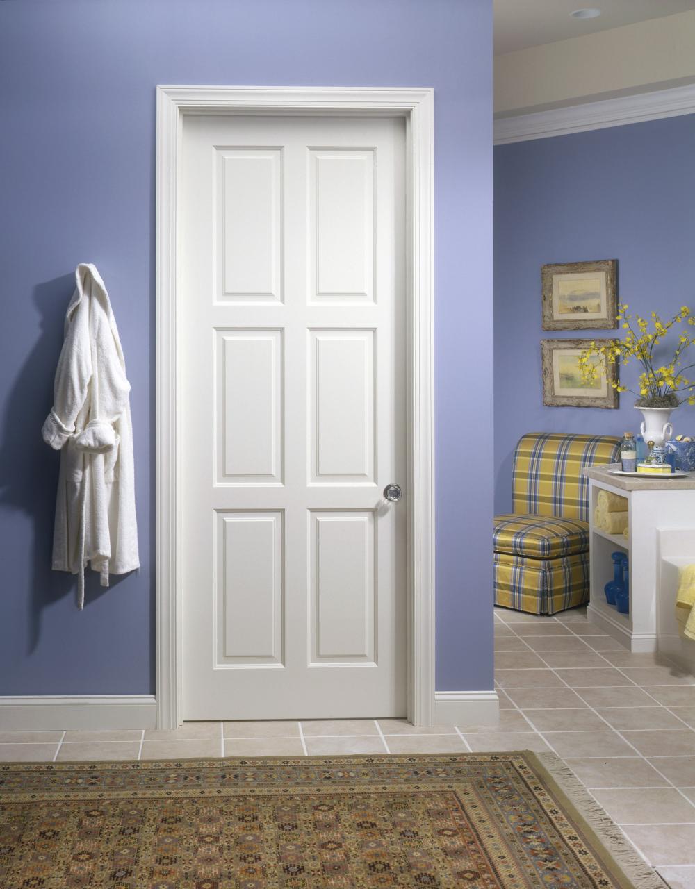 This bathroom features a TS6080 in MDF with custom sticking and raised (A) panel.