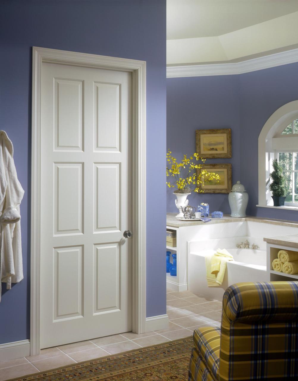 This bathroom features a TS6080 in MDF with custom sticking and raised (A) panel.