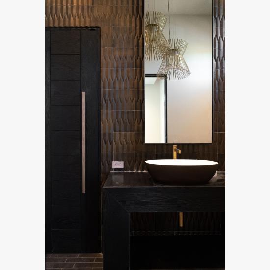 TM9000 in wire-brushed white oak with Ebony hand-wiped stain and 1/4" kerf cut reveal.