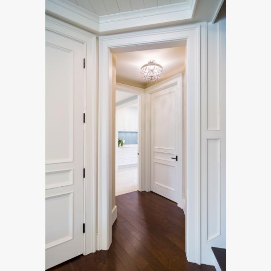 Hallway with TS3070 doors in MDF with Bolection moulding (BM) and Flat (C) panel.