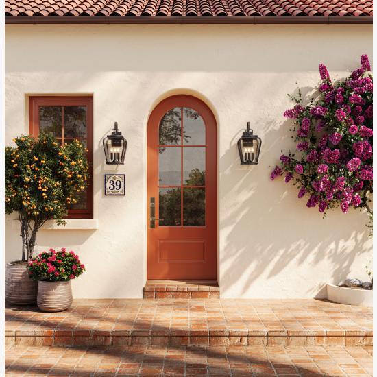 Radius-top Resilient FL619-ES401 entry system with clear glass on a Mediterranean-style home.
