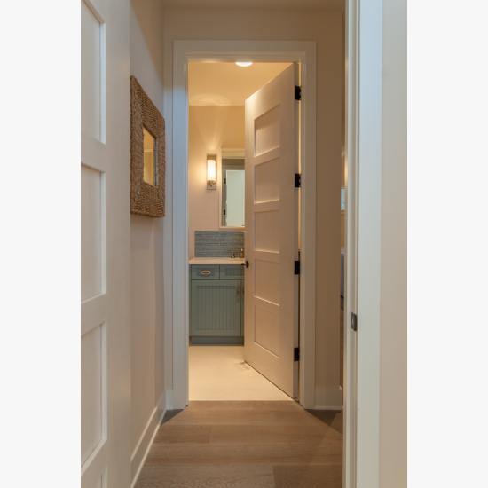 TM5000 birch door features custom whitewash finish to match the pastel color scheme of the home.