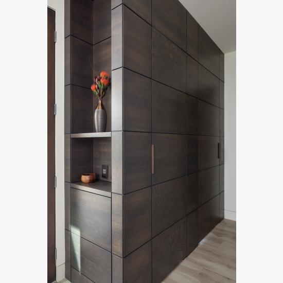 This cabinet features carefully concealed TMIR5000 doors in rift sawn white oak with Espresso stain and ¼" kerf cut reveal