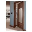 A TM9250 pantry door in walnut with Nutmeg stain and Thatch resin.