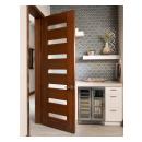 A TM9350 door in walnut with Nutmeg stain and Dash glass opens to a guest suite