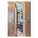 Pair of TM13000 barn doors in white oak with custom ceruse finish (TM1000 in background)
