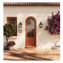 Radius-top Resilient FL619-ES401 entry system with clear glass on a Mediterranean-style home.