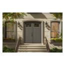 PL254-ES501 Resilient Wood Entry System with Cove & Bead sticking, Scoop panels, and clear glass, featured as a traditional double-door entrance with stone surrounds and decorative lanterns.
