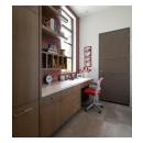 A TMIR5000 door in quarter sawn white oak with Grey Mist finish and ½" bright stainless steel inlays features a 20-minute fire rating.