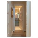 TM5000 birch door features custom whitewash finish to match the pastel color scheme of the home.