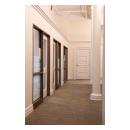 TS2020 doors in MDF with clear glass and One Step (OS) sticking, custom 5-panel door to right.