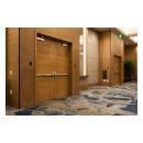 Pair of TM9000 doors in rift sawn white oak with 1/4" kerf cut reveal.