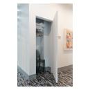 Concealed hinges and jamb allow this TMF1000 door in MDF to blend into the wall.